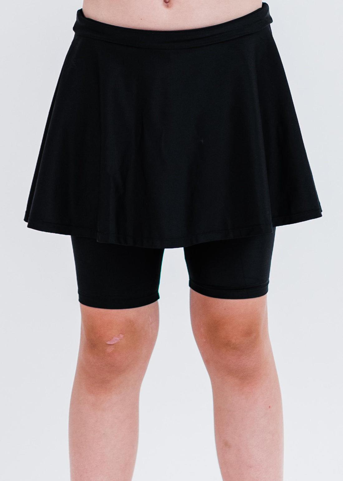 Girls swim skort. Modest skirt and pants. Girl's modest plus size swim skirt. Excellent sun protection UPF +50