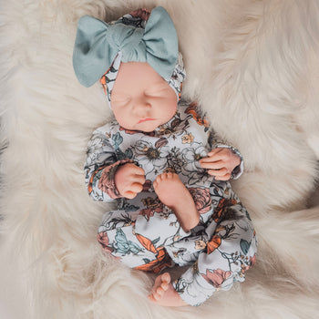 baby and toddler floral sleepsuit with matching bow turban