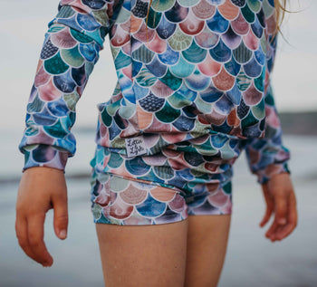 Infancy beachwear. Lottie & Lysh mermaid scales shorts and longsleeve swim top.