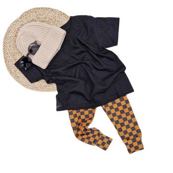 toddler boy clothes - Lottie & Lys checkbouard boys leggings, black t-shirt and beige knitted beanie hat flat lay image