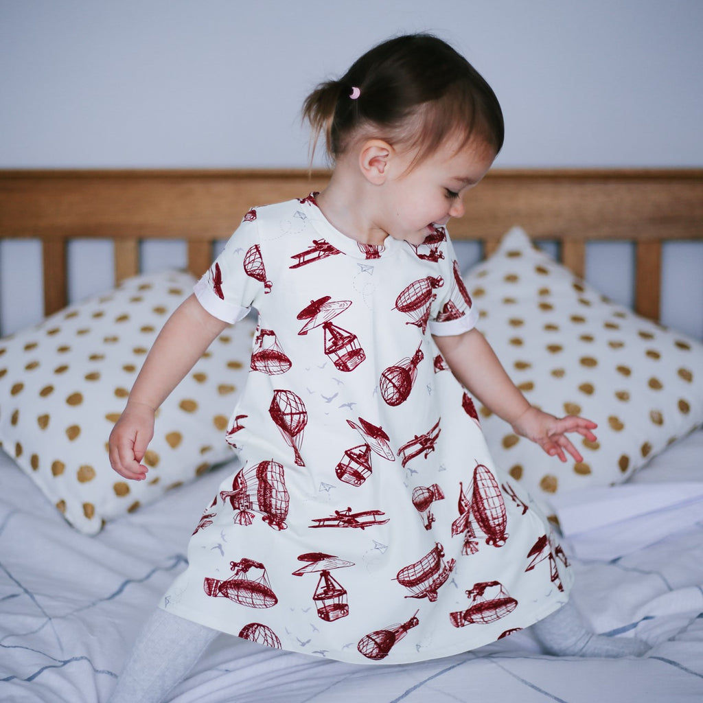 Air Travel baby girl dress by lottie and lysh