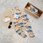 Handmade jersey dungarees with rainbow print by Lottie & Lysh
