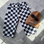 Baggy toddler trousers in black and white chefs checks fabric