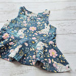 Flat lay of Bunny Love peplum top for babies and kids aged 0 to 10 years