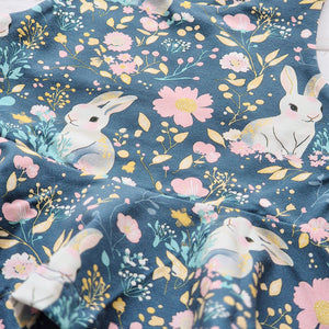 Close-up of sleeveless girls peplum top in ethical cotton jersey