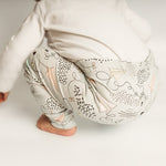 Unisex baby and toddler leggings by Lottie & Lysh. Paper plane and cloud print design