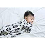 Newborn baby wearing monochrome baby romper made by lottie & lysh