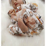 floral babygrow handmade in the uk by Lottie & Lysh