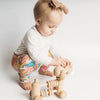 Dinosaur printed kids leggings handmade in the uk by lottie and lysh
