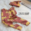 Flatlay image of Lottie & Lysh zipless romper in Rust with Lynx print