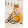 penguin print bandana bib and matching baby leggings paired with a long sleeve mustard top modelled by a 