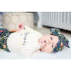 Autumn glow baby leggings and matching bow set worn by a baby girl