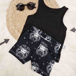 ethically made children's monochrome cycling shorts with lion print design