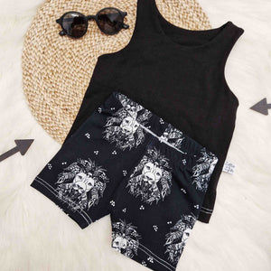 ethically made children's monochrome cycling shorts with lion print design
